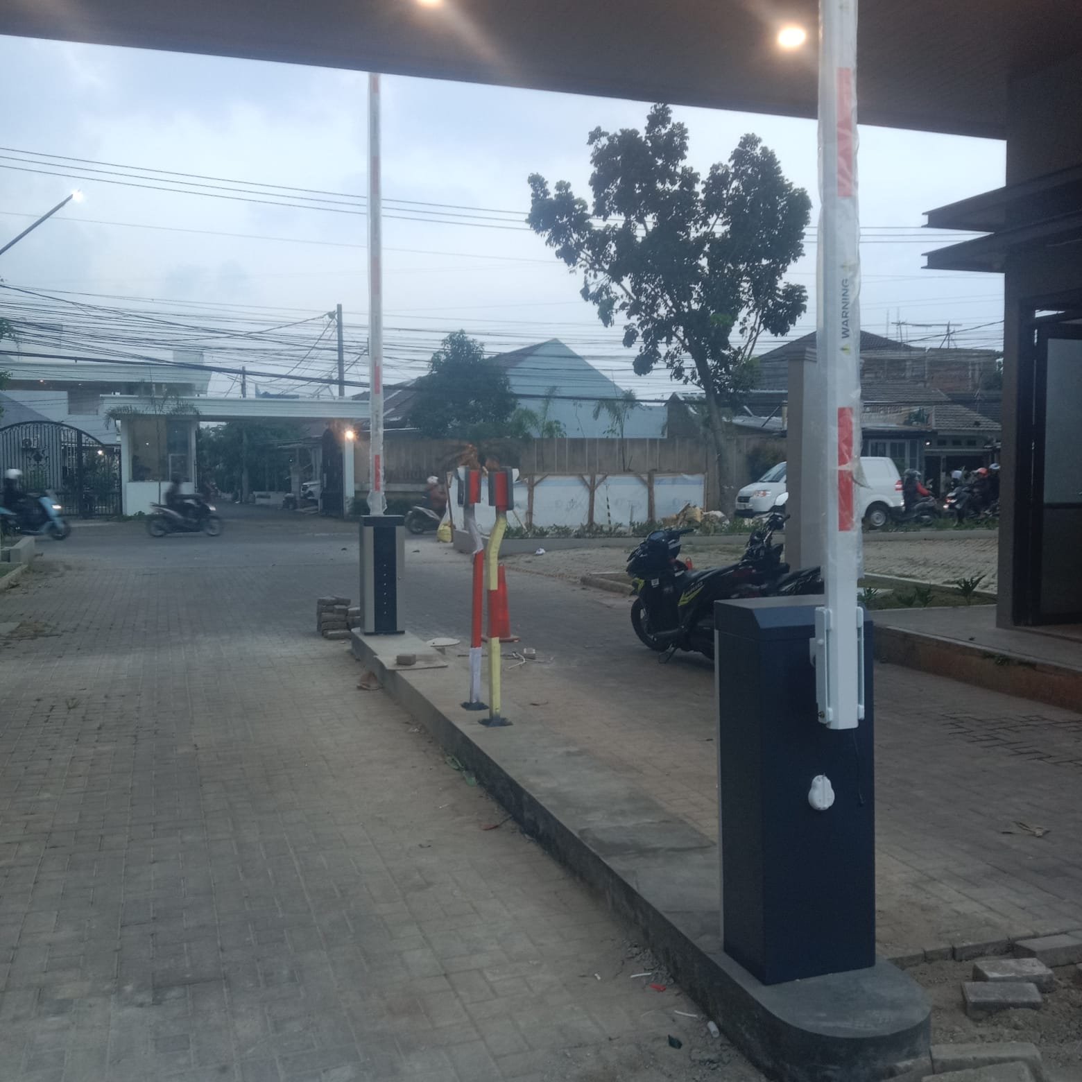 Optimalisasi Keamanan dan Efisiensi Akses Kendaraan pada Kawasan Perumahan Melalui Implementasi Palang Parkir Otomatis dan Sistem RFID Resident: Studi Kasus Barrier Gate M Gate oleh MSM Parking